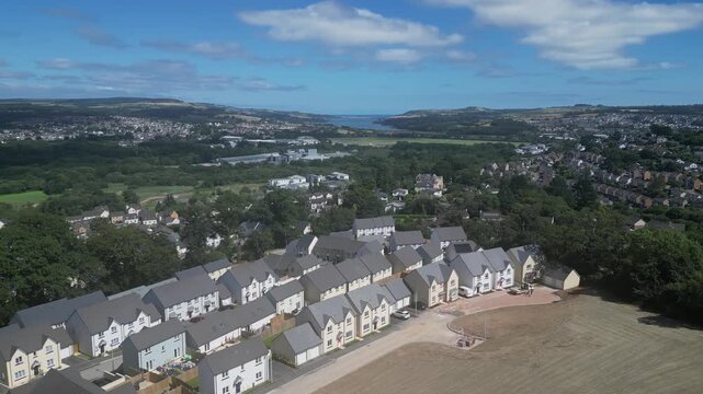 Newton Abbot, South Devon, England: A construction site for new build houses on green belt land in the TQ12 postcode area. The UK government has targeted 1.5 million new houses be built by 2030 (7).