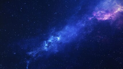 Fototapeta premium A stunning view of the Milky Way galaxy glowing in a dark night sky, filled with stars and cosmic dust.