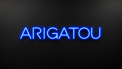 arigatou blue neon lettering on plain dark black background