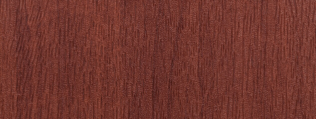 Dark brown leather background from textile material, macro. Texture of umber fabric backdrop.
