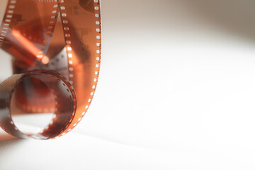 Curled Film Strip on Soft Background