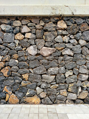 Background of stone wall texture. Old texture of granite stone wall surface.