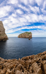 Rocky Coast with Cliffs on the Mediterranean Sea. Sardinia, Italy. Nature Background.