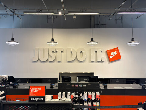 Barstow,California,USA-June 18th 2024: Nike store counter and Just do it slogan