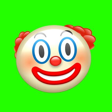 smiley face clow on a green background