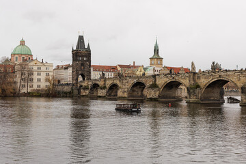 Prague's architecture reflects in still waters Charles Bridge