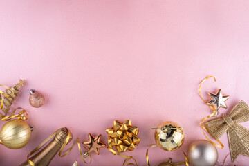 Merry Christmas and Happy New Year 2025 background with golden bauble, Christmas tree balls and decorations, gift bow, serpentine, 2025 golden candles numbers, flat lay top view copy space