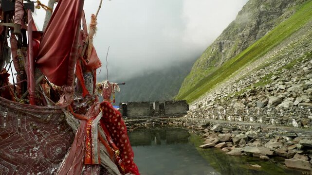 Sculpture of Hindu deity Goddess Gauri at Gauri Kund pond during Mani Mahesh Kailash Yatra, Chamba Valley, Himachal Pradesh, India. Hindu and Buddhist pilgrimage.