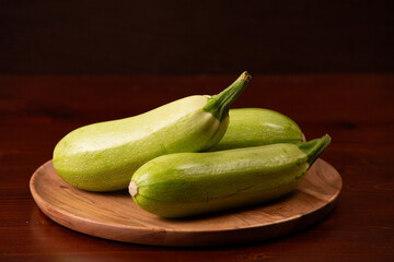 zucchini on a wooden plate