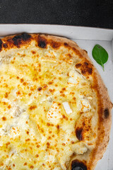 pizza cheese mozzarella, blue cheese, camembert and cheddar fresh meal food snack on the table copy space food background rustic top view