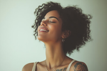 A close up of a woman's face with tattoos and her eyes closed