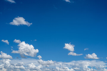 Fototapeta premium clouds and blue sunny sky, white clouds over blue sky, Aerial view, nature blue sky white cleat weather.