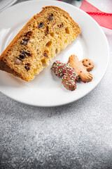 Panettone christmas cake baked sweet goods Christmas background New Year's holiday meal food snack on the table copy space food background rustic top view