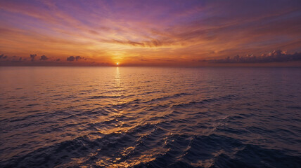 Dramatic Seaview at Sunset with Purple, Orange, and Yellow Sky Colors
