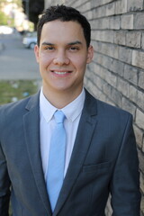 Private school male student wearing a preppy uniform 