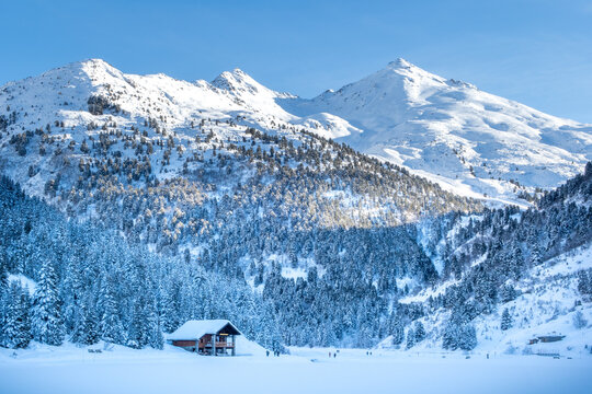 Mountains and forests in the Tu&eacute;da nature reserve in Meribel in the French Alps in winter