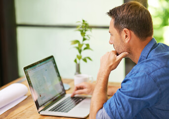 Architect, man and laptop with reading for remote work from home office with documents, idea or inspiration. Person, computer and paper scroll with screen, development or real estate project in house