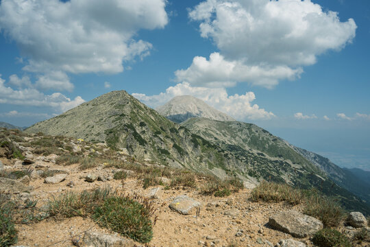 View on Muratov and Vihren Peaks with beautiful clouds in Bulgarian Pirin Mountains in July