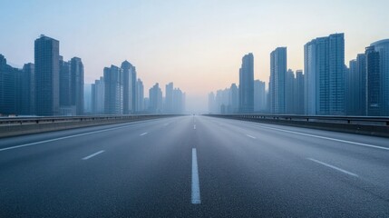 Empty Road Leading Towards a Skyline of High-Rise Buildings