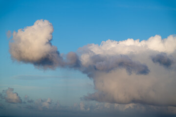 The clouds appear to be gently floating on a canvas of blue. A breathtaking view of a cloud-filled sky in Toucheng, Yilan, Taiwan.