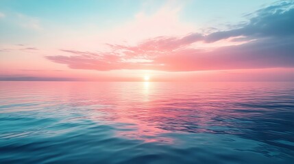 Obraz premium A serene sunset over a calm ocean, painted in hues of pink and blue, creating a tranquil atmosphere for relaxation and reflection.