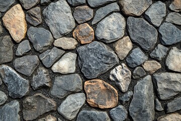 Fototapeta premium Close-up of diverse stones, showcasing unique textures and colors in a natural pattern for art and design purposes.