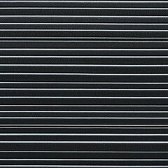 Obraz premium A bright red fire hydrant stands guard in front of a sturdy metal door