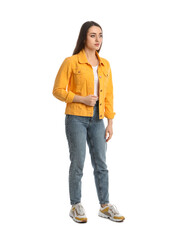 Fototapeta premium Young woman in casual clothes on white background