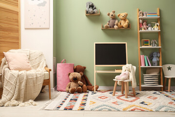 Stylish child room interior with different toys and furniture