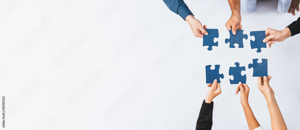 Fototapete Top view panorama banner of business team joining jigsaw puzzle together over meeting table symbolize business partnership and collective unity teamwork in problem solving solution. Prudent