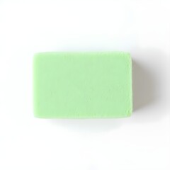 Absorb, a green sponge for absorbing liquids on a white background 