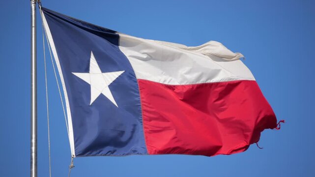Texas flag flying in slow motion