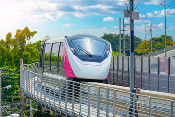 Modern high speed monorail train turn passes race station on the stage.