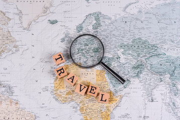 Conceptual background for travel with passport, magnifying glass, world map and money