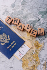 Conceptual background for travel with passport, magnifying glass, world map and money © chernikovatv