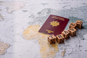 Conceptual background for travel with passport, magnifying glass, world map and money