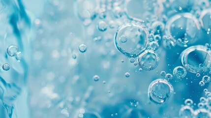 a close up of water bubbles on a blue surface