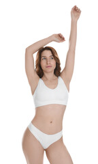 Fototapeta premium Woman with slim body posing on white background