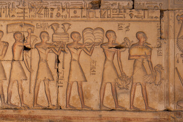Wall Reliefs showing Procession during a festival - Temple of Ramesses II at Abydos Middle Egypt.