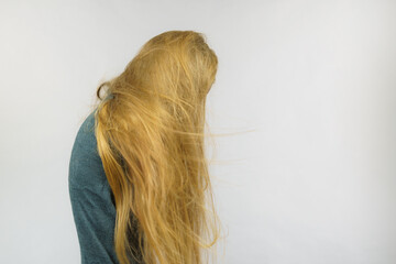 Girl hiding face with hair