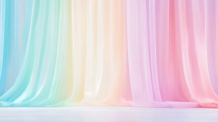 Obraz premium a series of sheer, flowing fabric panels hanging vertically. The fabric is arranged in a gradient of pastel colors, transitioning smoothly from light blue on the left, through shades of green