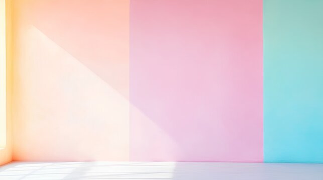  a wall divided into three vertical sections, each painted a different pastel color. From left to right, the sections are light peach, pink, and light blue
