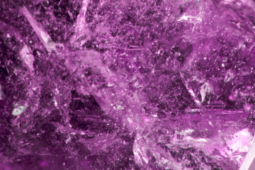 Close Up of a Rock Crystal with inclusions in Putple blue Rainbow