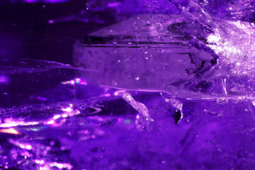 Close Up of a Rock Crystal with inclusions in Putple blue Rainbow