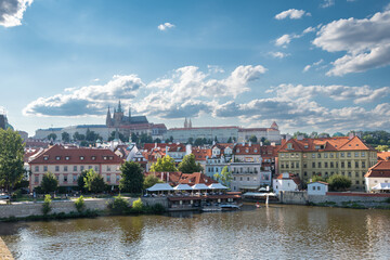 Fototapeta premium Buildings on the banks of the Vltava River, Prague, Czech Republic.