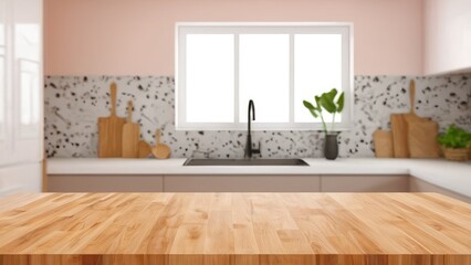 A warm, wooden kitchen surface with a bright, blurred kitchen backdrop, highlighting the cozy and modern atmosphere of the cooking space