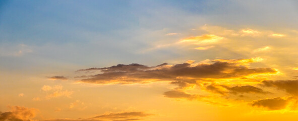 Picturesque evening sky with whimsical clouds