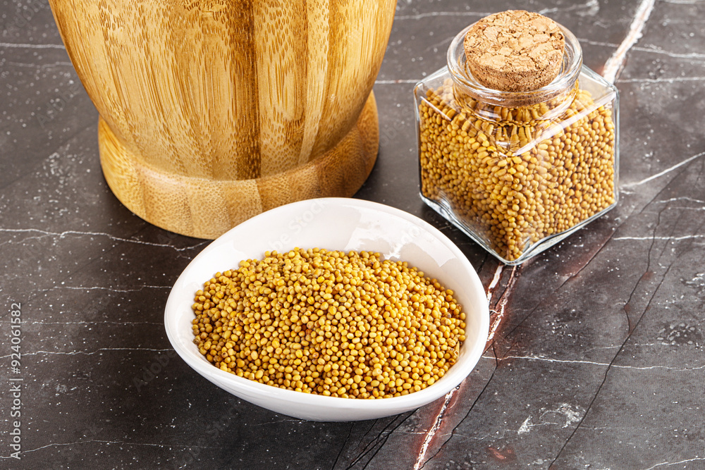 Sticker mustard dry seeds in the bowl