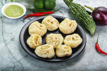 Nepali steamed dumplings  Momo with sause