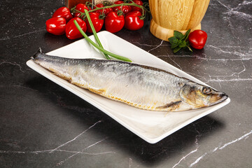 Whole raw salted herring fish